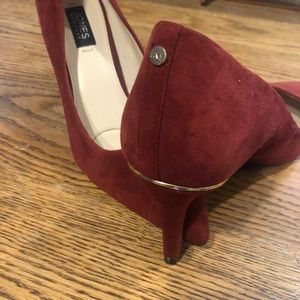 Red suede pointed toe heels